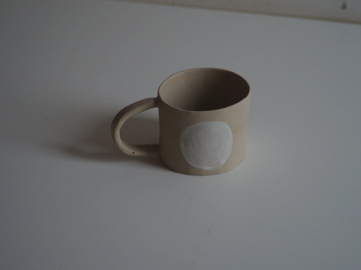 mokje met witte stip